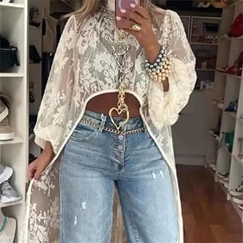 Women's long-sleeved blouse with lace details and a long back